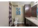 Bathroom with dark wood vanity and a shower at 4808 N 24Th St # 305, Phoenix, AZ 85016