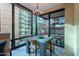 Small dining area with a modern table and chairs near windows at 4808 N 24Th St # 305, Phoenix, AZ 85016