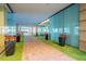 Building entrance with modern design and potted plants at 4808 N 24Th St # 305, Phoenix, AZ 85016