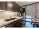 Updated kitchen with stainless steel appliances and granite countertops at 4808 N 24Th St # 305, Phoenix, AZ 85016