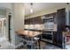 Eat-in kitchen featuring wood countertops and stainless steel appliances at 4808 N 24Th St # 305, Phoenix, AZ 85016
