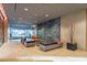 Elegant lobby with modern seating and a granite feature wall at 4808 N 24Th St # 305, Phoenix, AZ 85016
