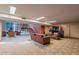 Relaxing lounge with leather sofas and a fireplace at 4808 N 24Th St # 305, Phoenix, AZ 85016