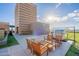 Rooftop patio with grill and seating area at 4808 N 24Th St # 305, Phoenix, AZ 85016
