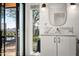 Modern bathroom with marble vanity and a view at 5419 E Valle Vista Rd, Phoenix, AZ 85018