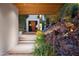 Modern entryway with unique geometric door design at 5419 E Valle Vista Rd, Phoenix, AZ 85018