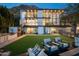 Modern home exterior with a backyard and lawn at 5419 E Valle Vista Rd, Phoenix, AZ 85018