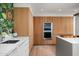 Contemporary kitchen with wood cabinets and stainless steel appliances at 5419 E Valle Vista Rd, Phoenix, AZ 85018