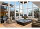 Spacious living room with floor to ceiling windows and city views at 5419 E Valle Vista Rd, Phoenix, AZ 85018