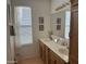 Double vanity bathroom with ample counter space at 5518 E Lindstrom Ln # 2004, Mesa, AZ 85215