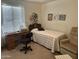 Inviting bedroom with twin bed, desk, and recliner at 5518 E Lindstrom Ln # 2004, Mesa, AZ 85215