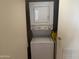 Convenient laundry closet with stacked washer and dryer at 5518 E Lindstrom Ln # 2004, Mesa, AZ 85215