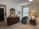 Main bedroom with dresser, chair, and nightstand at 5518 E Lindstrom Ln # 2004, Mesa, AZ 85215