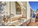 The exterior view of the home with awning shades and a small stairway at 7750 E Broadway Rd # 906, Mesa, AZ 85208