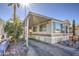 Lovely single-story home featuring covered parking and an inviting outdoor space at 7750 E Broadway Rd # 906, Mesa, AZ 85208