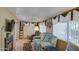 Relaxing living room featuring a sofa, fireplace, and shelving at 7750 E Broadway Rd # 906, Mesa, AZ 85208