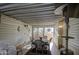 Enclosed patio with a dining table, chairs, and decorative wall art at 7750 E Broadway Rd # 906, Mesa, AZ 85208