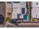 Aerial view showcasing the pool, solar panel-covered roof, and verdant landscaping at 7844 E Coolidge St, Scottsdale, AZ 85251