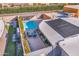 An elevated view showing the home’s pool, patio, and solar panels at 7844 E Coolidge St, Scottsdale, AZ 85251