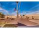 Large backyard featuring decorative gravel, palm trees, and desert landscaping at 7844 E Coolidge St, Scottsdale, AZ 85251