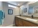 Bathroom featuring dual sinks and granite countertops at 7844 E Coolidge St, Scottsdale, AZ 85251