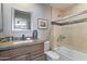 Stylish bathroom featuring granite countertops, tiled shower, and modern fixtures at 7844 E Coolidge St, Scottsdale, AZ 85251