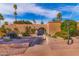 Inviting home entrance featuring a walkway, decorative plants, and desert landscaping at 7844 E Coolidge St, Scottsdale, AZ 85251
