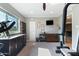 Spacious exercise room with dresser, shelving and gym equipment at 7844 E Coolidge St, Scottsdale, AZ 85251