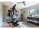 Exercise room with weight machines, stationary bike and window at 7844 E Coolidge St, Scottsdale, AZ 85251