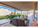 Inviting covered patio with ample seating, ideal for enjoying the serene outdoor space at 7844 E Coolidge St, Scottsdale, AZ 85251