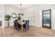 Well-lit dining area featuring stylish decor and plenty of natural light from shuttered windows at 8708 E San Lucas Dr, Scottsdale, AZ 85258