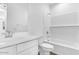 Bright bathroom featuring a tub, a white vanity with a sink, and a toilet at 9036 S 196Th Dr, Goodyear, AZ 85338