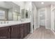 Elegant bathroom with double vanity and large mirror at 11682 W Parkway Ln, Avondale, AZ 85323