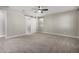 Bright bedroom with neutral walls and carpet flooring at 11682 W Parkway Ln, Avondale, AZ 85323