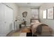 Cozy bedroom with a twin bed and built-in desk at 11682 W Parkway Ln, Avondale, AZ 85323