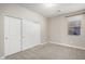 Bedroom with large closet and window at 11682 W Parkway Ln, Avondale, AZ 85323