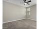 Simple bedroom with window and ceiling fan at 11682 W Parkway Ln, Avondale, AZ 85323