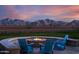 Community fire pit with mountain views and seating at 11682 W Parkway Ln, Avondale, AZ 85323