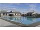 Community pool with adjacent restrooms and landscaping at 11682 W Parkway Ln, Avondale, AZ 85323