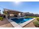 Relaxing backyard oasis with a refreshing pool at 11682 W Parkway Ln, Avondale, AZ 85323