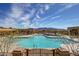 Resort-style pool with mountain views and ample lounge space at 18125 W Acacia Dr, Goodyear, AZ 85338