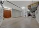 Large garage with extra storage space at 18125 W Acacia Dr, Goodyear, AZ 85338