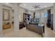 Home office with built-in shelving, deskspace and natural light at 18125 W Acacia Dr, Goodyear, AZ 85338
