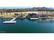 Aerial view of lake with boathouse and dock at 18125 W Acacia Dr, Goodyear, AZ 85338