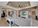 Light and airy living room with built-in entertainment center at 18125 W Acacia Dr, Goodyear, AZ 85338