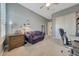 Home office with a comfortable couch and desk at 18125 W Acacia Dr, Goodyear, AZ 85338