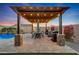 Covered patio perfect for outdoor dining and entertaining at 18125 W Acacia Dr, Goodyear, AZ 85338