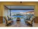 Inviting backyard oasis with a sparkling pool and covered patio at 18125 W Acacia Dr, Goodyear, AZ 85338