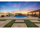 Stunning pool with a pergola and spacious backyard at 18125 W Acacia Dr, Goodyear, AZ 85338