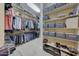 Large walk-in closet with ample shelving and hanging space at 18125 W Acacia Dr, Goodyear, AZ 85338